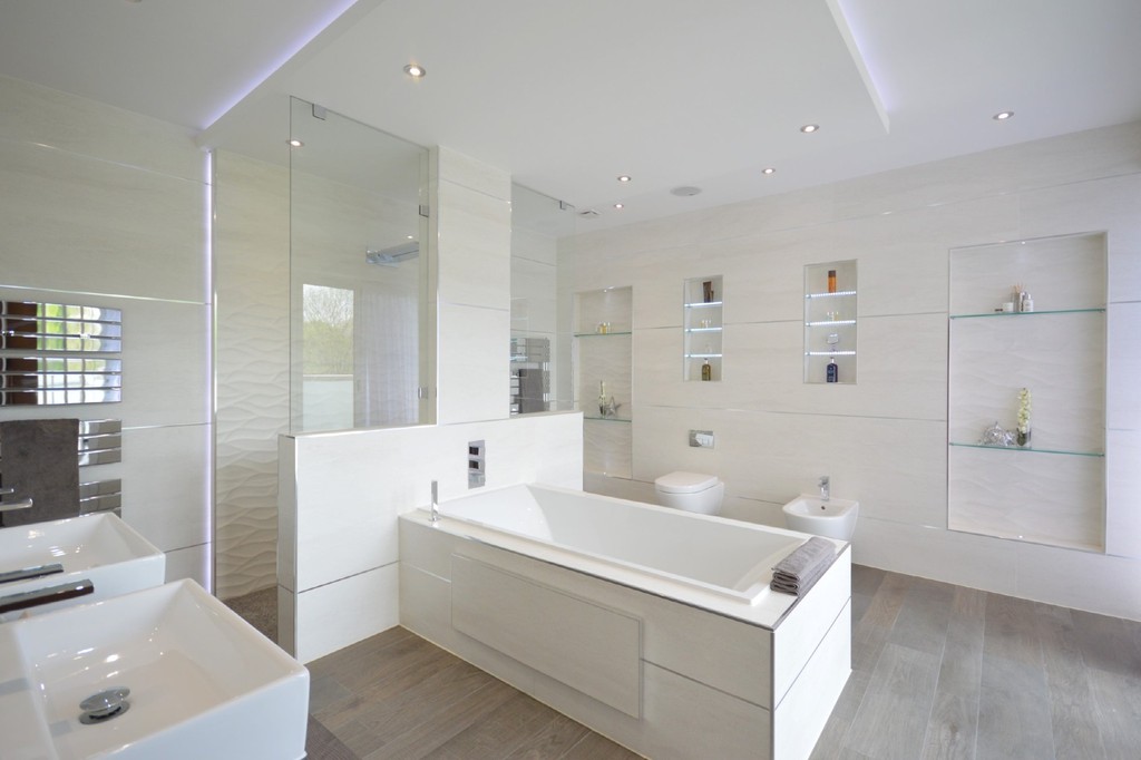 Grey wood-look tile flooring installed in a bathroom