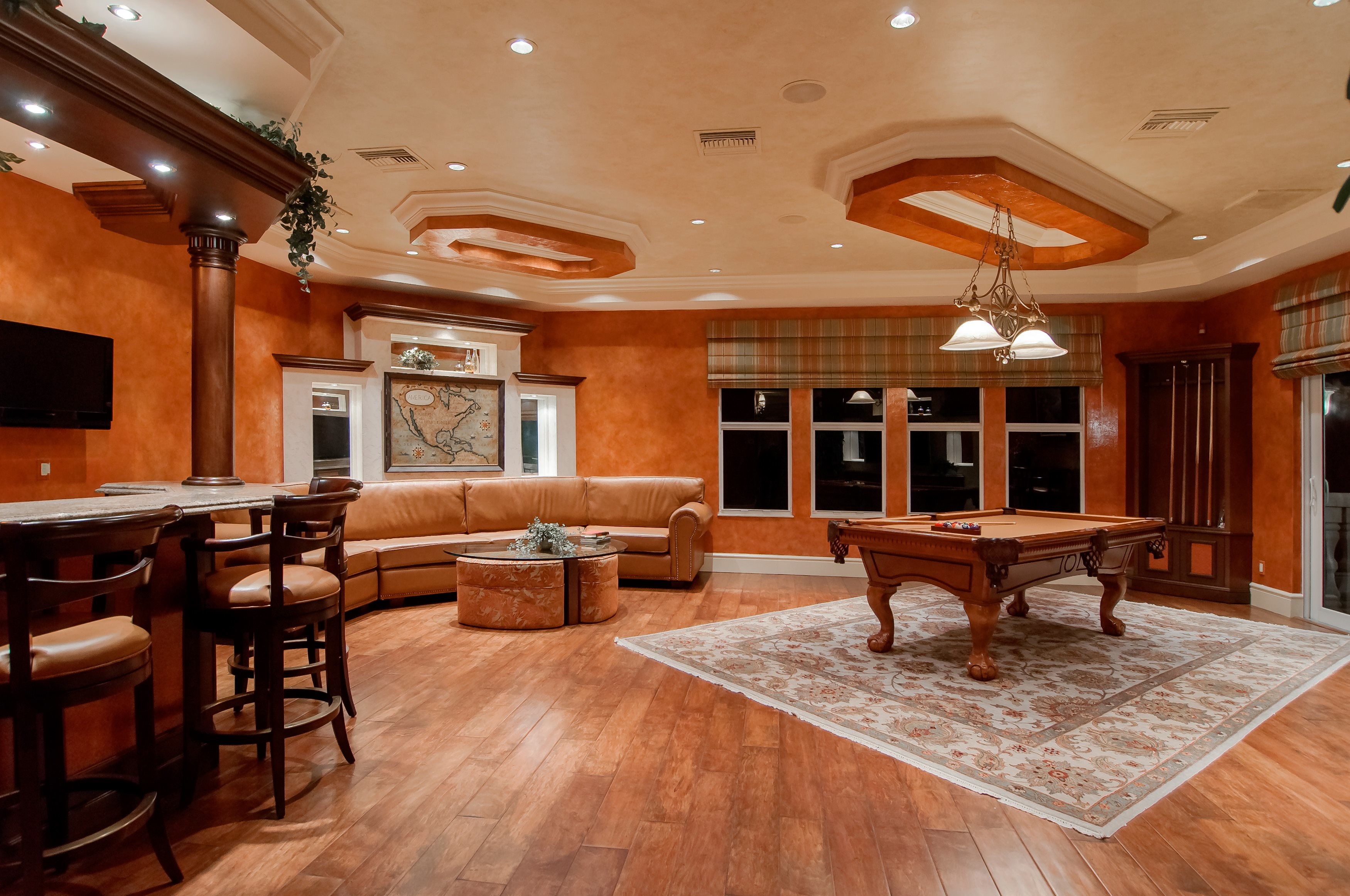 Remodeled Basement with wide-plank wood floors