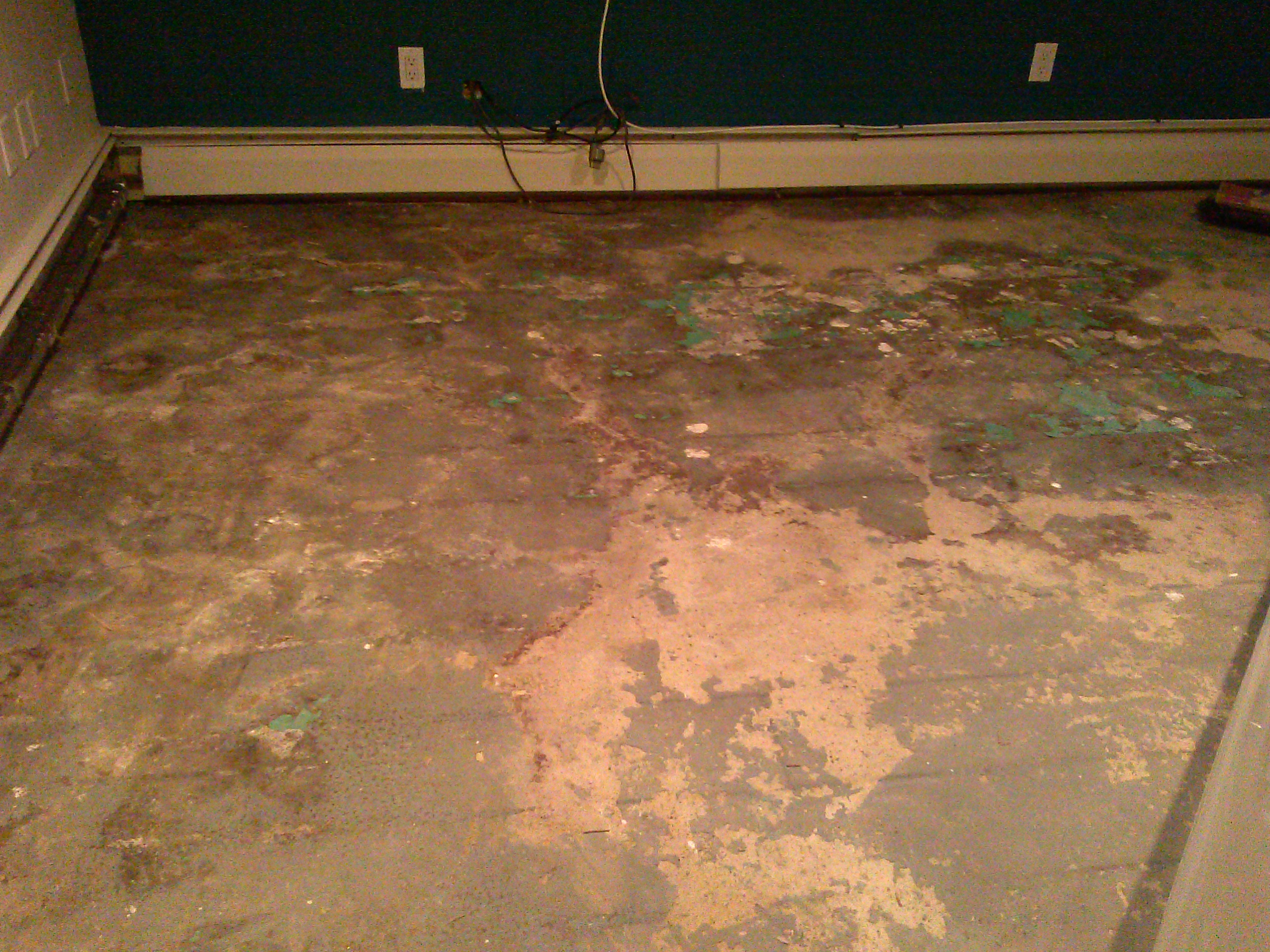 Basement slab needing prep-work for new finishes